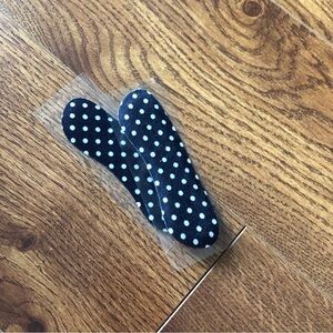 Black and white polka dot shoe cushions